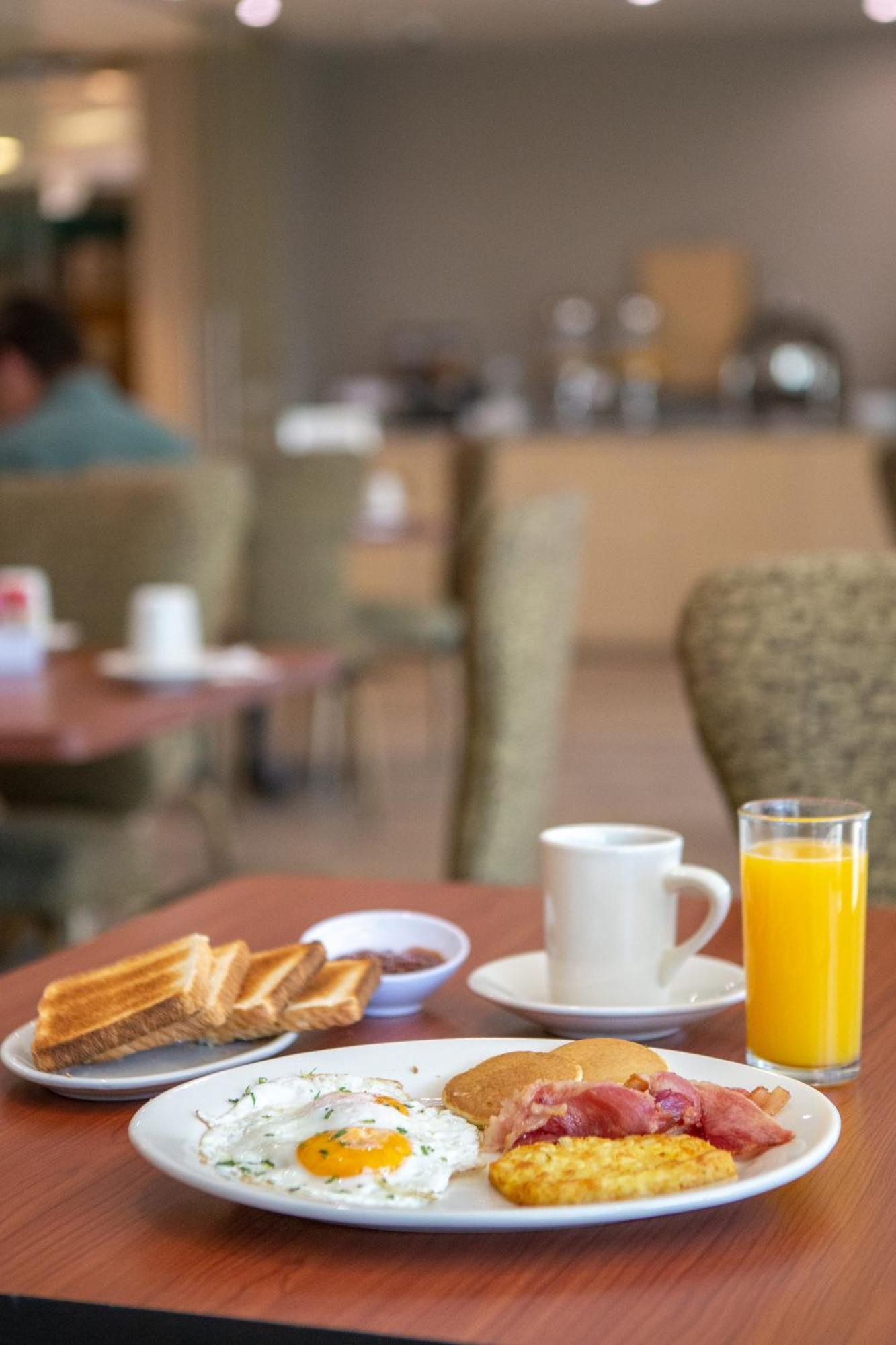 La Joya Pachuca Hotel Kültér fotó A breakfast with orange juice
